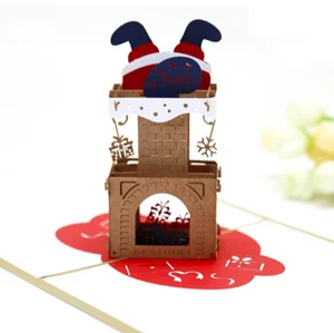 3D pop up Christmas card with Santa stuck in chimney